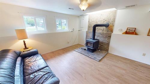 3109 Mt Royal Drive, Cranbrook, BC - Indoor Photo Showing Living Room With Fireplace