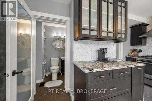 2 piece bath/laundry - 570 Frontenac Street, Kingston (East Of Sir John A. Blvd), ON - Indoor Photo Showing Kitchen With Upgraded Kitchen