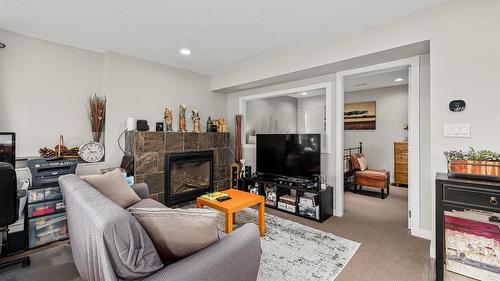 5821 Atkinson Crescent, Peachland, BC - Indoor Photo Showing Other Room With Fireplace