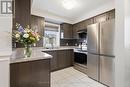 AI Staged - 67 Tabaret Crescent, Oshawa (Windfields), ON  - Indoor Photo Showing Kitchen With Double Sink 