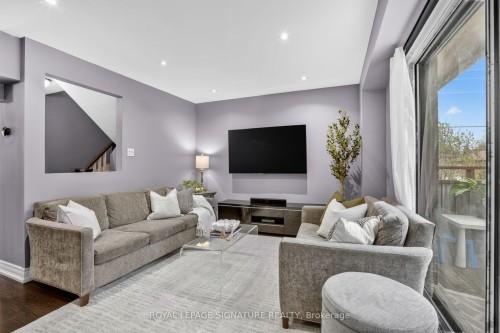 53 Poets Walk Way, Toronto, ON - Indoor Photo Showing Living Room With Fireplace