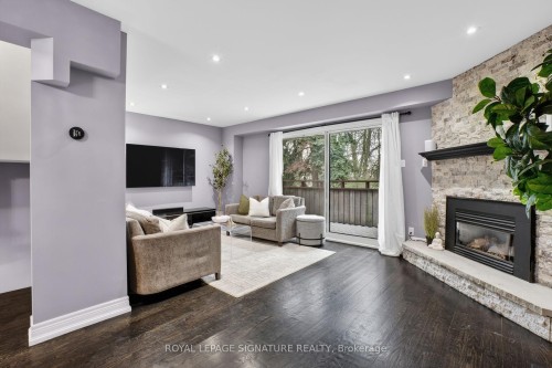 53 Poets Walk Way, Toronto, ON - Indoor Photo Showing Living Room With Fireplace