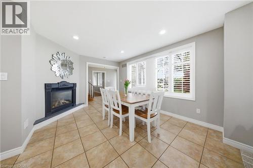 383 North Shore Boulevard W, Burlington, ON - Indoor Photo Showing Dining Room With Fireplace