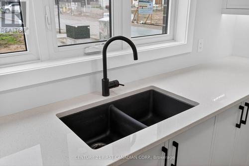 34 Postma Crescent, North Middlesex (Ailsa Craig), ON - Indoor Photo Showing Kitchen With Double Sink