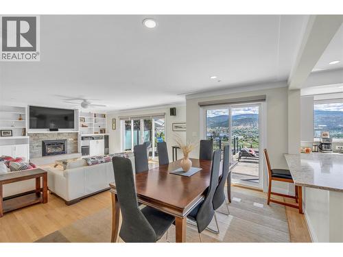 1213 Lambert Drive, Penticton, BC - Indoor Photo Showing Dining Room With Fireplace
