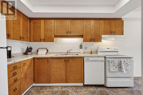 33 Haxby Private, Ottawa, ON - Indoor Photo Showing Kitchen With Double Sink