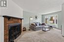 33 Haxby Private, Ottawa, ON  - Indoor Photo Showing Living Room With Fireplace 