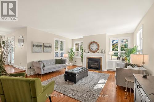 5763 Gowan Gate, Ottawa, ON - Indoor Photo Showing Living Room With Fireplace