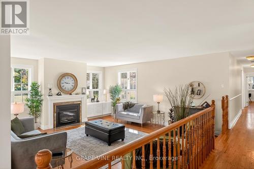 5763 Gowan Gate, Ottawa, ON - Indoor Photo Showing Living Room With Fireplace