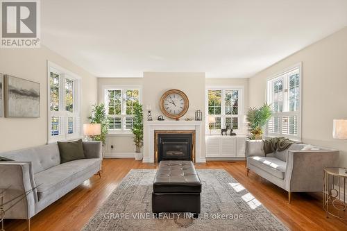 5763 Gowan Gate, Ottawa, ON - Indoor Photo Showing Living Room With Fireplace