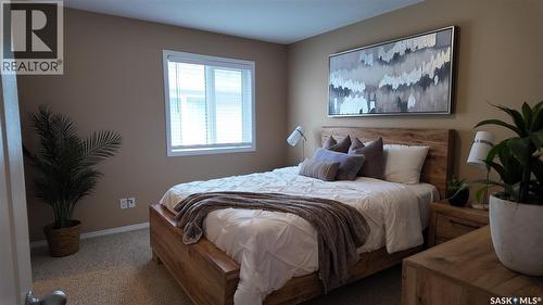 E 4128 Buckingham Drive, Regina, SK - Indoor Photo Showing Bedroom