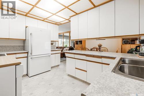 211 2Nd Street E, Langham, SK - Indoor Photo Showing Kitchen With Double Sink