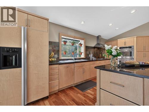3929 Gallaghers Circle, Kelowna, BC - Indoor Photo Showing Kitchen With Double Sink