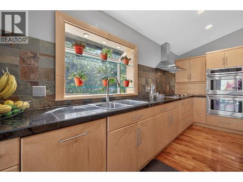 3929 Gallaghers Circle, Kelowna, BC - Indoor Photo Showing Kitchen With Double Sink