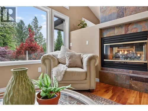 3929 Gallaghers Circle, Kelowna, BC - Indoor Photo Showing Living Room With Fireplace