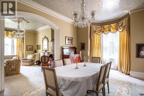 Formal dining area with an oval table and upholstered chairs - 370 Hess Street S, Hamilton, ON - Indoor Photo Showing Dining Room