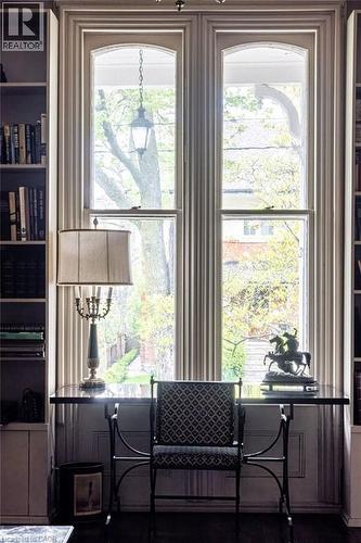 Tall arched windows with fluted trim detail - 370 Hess Street S, Hamilton, ON - Indoor