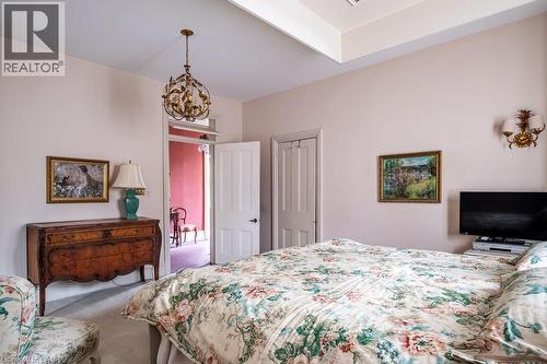 Recessed ceiling detail and wall-mounted sconces - 370 Hess Street S, Hamilton, ON - Indoor Photo Showing Bedroom