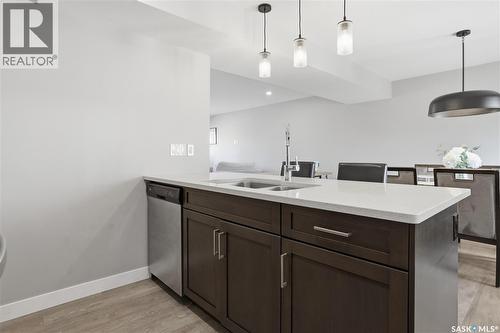 4521 E Keller Avenue, Regina, SK - Indoor Photo Showing Kitchen With Double Sink