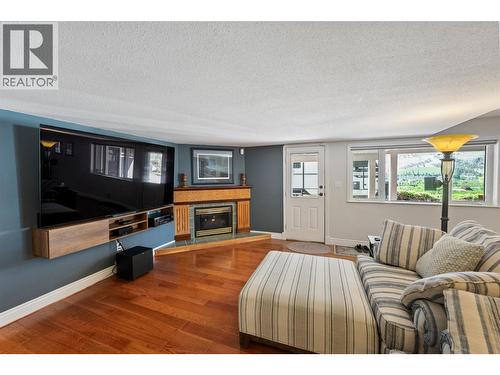 101 2Nd Avenue, Keremeos, BC - Indoor Photo Showing Living Room With Fireplace