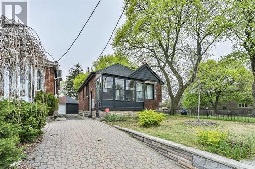 Long driveway with parking in back - 388 O'Connor Drive, Toronto, ON - Outdoor