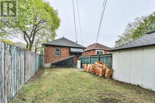 Fenced off yard ideal for kids & pets - 388 O'Connor Drive, Toronto, ON - Outdoor With Exterior