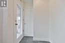 Door to closed off sun filled front porch - 388 O'Connor Drive, Toronto, ON  - Indoor Photo Showing Other Room 