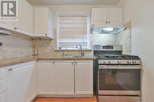 Renovated kitchen - 388 O'Connor Drive, Toronto, ON - Indoor Photo Showing Kitchen With Double Sink