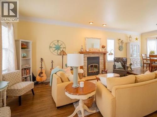 10067 Highway 101, Powell River, BC - Indoor Photo Showing Living Room With Fireplace