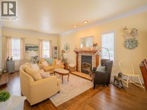 10067 Highway 101, Powell River, BC - Indoor Photo Showing Living Room With Fireplace