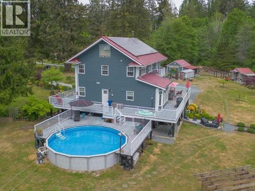 10067 Highway 101, Powell River, BC - Outdoor With Above Ground Pool With Deck Patio Veranda With Backyard