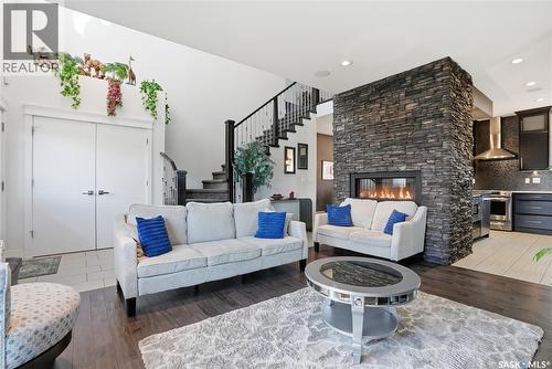 102 Teal Crescent, Saskatoon, SK - Indoor Photo Showing Living Room With Fireplace