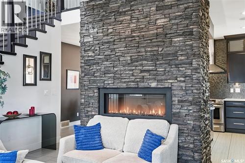 102 Teal Crescent, Saskatoon, SK - Indoor Photo Showing Living Room With Fireplace