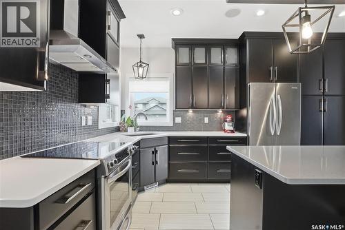 102 Teal Crescent, Saskatoon, SK - Indoor Photo Showing Kitchen With Upgraded Kitchen