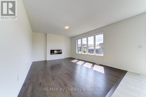 174 Mapleside Drive, Wasaga Beach, ON - Indoor Photo Showing Other Room With Fireplace