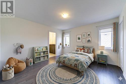 AI Generated - 174 Mapleside Drive, Wasaga Beach, ON - Indoor Photo Showing Bedroom