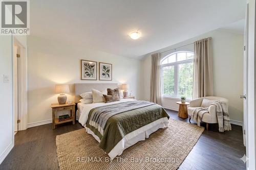 AI Generated - 174 Mapleside Drive, Wasaga Beach, ON - Indoor Photo Showing Bedroom
