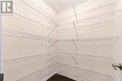 Second Floor Walk-In Linen Closet - 174 Mapleside Drive, Wasaga Beach, ON - Indoor With Storage