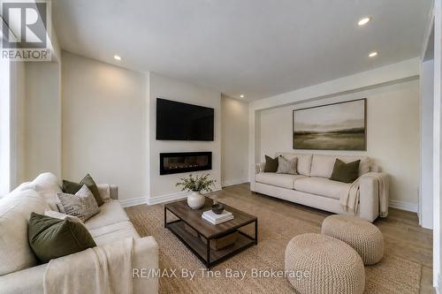 182 Mapleside Drive, Wasaga Beach, ON - Indoor Photo Showing Living Room With Fireplace