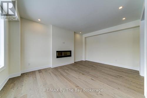 182 Mapleside Drive, Wasaga Beach, ON - Indoor Photo Showing Other Room With Fireplace