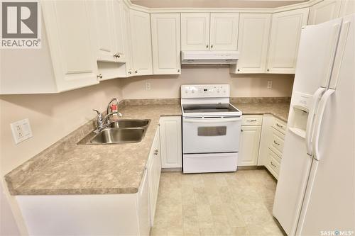 220 Cedar Meadow Drive, Regina, SK - Indoor Photo Showing Kitchen With Double Sink