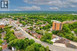 Aerial perspective showcasing a mixed-use neighborhood with residential and commercial structures - 
