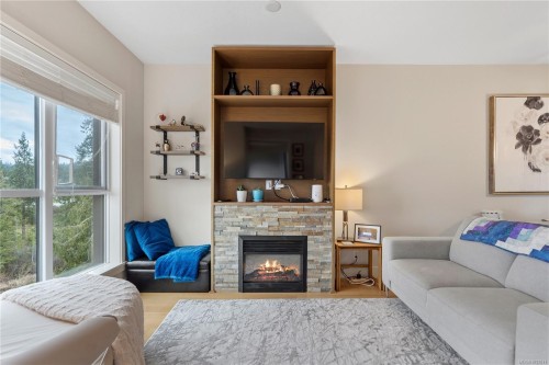 #618-1400 Lynburne Pl, Langford, BC - Indoor Photo Showing Living Room With Fireplace