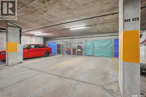 212 235 Evergreen Square, Saskatoon, SK - Indoor Photo Showing Garage