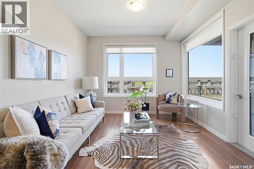 212 235 Evergreen Square, Saskatoon, SK - Indoor Photo Showing Living Room