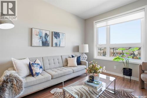 212 235 Evergreen Square, Saskatoon, SK - Indoor Photo Showing Living Room