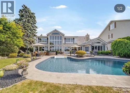 13018 Riverside Drive, Tecumseh, ON - Outdoor With In Ground Pool