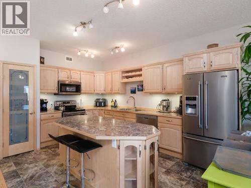 137 Olive May Way, Whitehorse, YT - Indoor Photo Showing Kitchen With Stainless Steel Kitchen