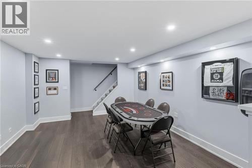 Finished lower level featuring recessed lighting and wood-finish flooring - 2116 Binbrook Road E, Hamilton, ON - Indoor