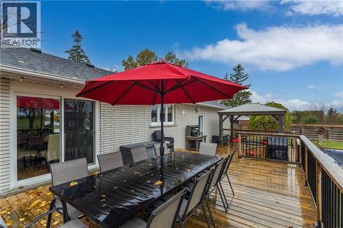 Spacious wood deck featuring a covered gazebo and black metal railings - 2116 Binbrook Road E, Hamilton, ON - Outdoor With Deck Patio Veranda